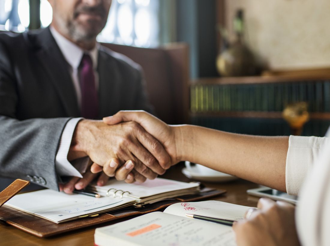 Attorney meeting with a client at Russell Mirkovich & Morrow